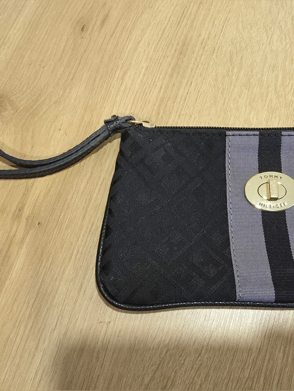 Tommy Hilfiger Black Wristlet Clutch with Gray Stripe and Gold-Tone Turnlock